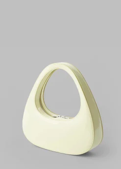 The Frankie Shop Coperni Patent Baguette Swipe Bag Light Yellow Online